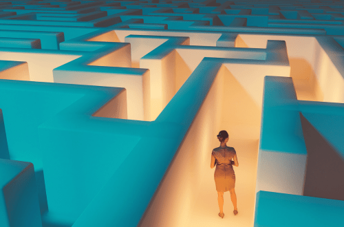 A woman stands in the middle of a maze, representing how women leaders navigate success.